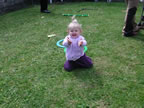 Chloe with my juggling equipment at St.Marks Fun Day (June 2003)