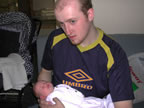 Me (Steve) holding my God-daughter Chloe