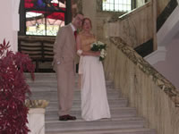 Scott and Ann on stairway at Registry Office