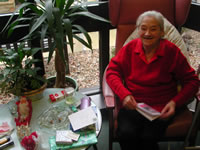 Gran getting presents on CHRISTmas Day 2002