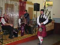 Laurie bagpiping